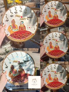 four plates with designs on them being held by someone's hands in front of the camera