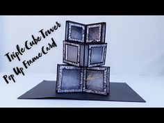 an origami sculpture made out of three cubes with the words triple cake tower on it