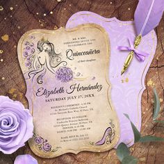 an ornate purple and gold wedding card with flowers on it, next to a feather quill pen