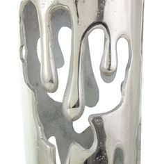 an abstract silver vase is shown on a white background