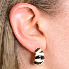 Product Description: Get in touch with your inner tiger. These half hoop earrings featuring black and white enameling will turn heads. Oh My.    Dimensions: 1" long Style Number: 6801EBWP Half Hoop Earrings, Nature Earrings, Tiger Stripes, Long Style, Clip Earrings, Earings Piercings, Oh My, Clip On Earrings, Hoop Earrings