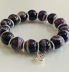 Amethyst Bracelet February Birthstone Natural Amethyst | Etsy Amethyst 8mm Beads Jewelry Gift, Adjustable Purple Stretch Bracelet With Natural Stones, Spiritual Silver Stretch Bracelet With Gemstone, Purple Amethyst Charm Bracelet For Gift, Purple Amethyst Charm Bracelet Gift, Purple Spiritual Charm Bracelet For Healing, Hand-strung Amethyst Stretch Bracelet, Adjustable Amethyst Round Bead Gemstones, Amethyst Stretch Bracelet With Round Beads For Gift