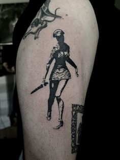 a person with a tattoo on their arm