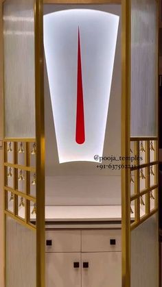 an open door with a red tie hanging from it's center piece in the hallway