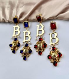 Are you looking for the perfect Tudor-inspired Anne Boleyn earrings for someone special this gifting season? Or one of my unique Tudor earrings to spoil your bestie or significant other? Made with tarnish-free stainless steel and antique repurposed jewelry elements, my Renaissance earrings are the perfect compliment to any outfit idea! My blue statement earrings are a great gift idea for any special occasion to all the women in your life. You can't go wrong when gifting my regal Tudor jewelry to Tudor Earrings, Anne Boleyn Costume, Tudor Jewelry, Blue Statement Earrings, Antiques Repurposed, Medieval Cosplay, Medieval Wedding, Medieval Jewelry, The Tudors