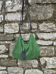 Features : - Green soft suede, - Black hand dyed leather, - Zipped bag, - Unlined, - Inside cotton zipped pocket, Size: - Height 10.63 inch, - Lenght 14.96 inch, - Shoulder belt is adjustable. Handmade soft green suede  hobo bag  The bag is closed with a metallic zip.  Inside is unlined and there is a large cotton zipped pocket. There is a adjustable shoulder strap made with strong hand dyed black leather. This medium size hobo bag is a perfect bag for every moment Contact me for any information Suede Hobo Bag, Strong Hand, Shoulder Belt, Green Soft, Hobo Bags, Zipped Bag, Green Suede, Hobo Handbags, Perfect Bag