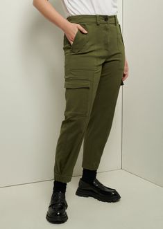 The Elian Utility Pant is crafted from a soft stone-washed stretch cotton twill. Based on a Derek Lam 10 Crosby signature silhouette, these pants are tailored with a relaxed fit, mid-rise and tapered leg. They feature utility pockets on the front and side and patch pockets on the back. Relaxed fit Workwear Cargo Pants With Five Pockets, Fall Chinos With Cargo Pockets, Relaxed Fit Cargo Ankle-length Bottoms, Ankle-length Relaxed Fit Cargo Bottoms, Ankle-length Relaxed Fit Cargo Pants, Cargo Style Chinos For Work, Khaki Cargo Pants For Work With Five Pockets, Mid-rise Cargo Pants For Work With Five Pockets, Cargo Style Tapered Leg Chinos For Work