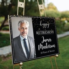 a black and white sign that says happy retirement with an image of james masterson on it