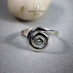 Coupon, 70% off when you buy 5 items https://www.etsy.com/in-en/shop/Sterlingsilver2020?coupon=BUY5ITEMSGET70OF We are made of 925 Sterling Silver by Hands Spiral Silver Ring , 925 Sterling Silver Ring , Statement Ring , Handmade Ring , Women Ring , Spiral Ring , Promise Ring , Right Hand Ring Ring Style: Statement Ring/ Heart Ring Metal: 925 Sterling Silver Ring Size: 4- 14 US Weight: 5-12 Gm Approx Occasion : Birthday Events, Lovely Valentine's Day Gift, Anniversary Gift, Weeding Gift, Engagement , Lover Gift, Hen Party And Other Occasion. Celebration: Christmas Day Gift, Mother's Day Gift, Father's Day Gift, Friendship Day Gift, Easter Sunday And Other Celebration  ✈ Free Shipping (UPS, Dhl) 🎁 Free Gift Box ✈ ✈ Shipping Services✈ ✈  ✔We ship the item through Dhl eCommerce, UPS shipping Minimalist Sterling Silver Spiral Ring, Minimalist Spiral Sterling Silver Ring, Handmade Spiral Minimalist Rings, Handmade Minimalist Spiral Rings, Minimalist Handmade Spiral Rings, Spiral Stackable Sterling Silver Rings For Gift, Spiral Stackable Sterling Silver Rings As Gift, Sterling Silver Spiral Stackable Rings As A Gift, Adjustable Swirl Ring As Gift