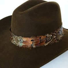 Hat Bands | Feather | Shikoba Western Hat Styles, Feather Hat Band, Feather Ideas, Cowboy Hat Styles, Buckle Bunny, Cowboy Hat Bands, Boutique Inspiration, Cowgirl Fashion, Hat Bands