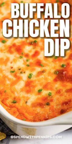 buffalo chicken dip in a white casserole dish with text overlay that reads buffalo chicken dip