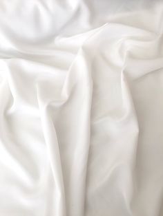 an image of white sheets that are very soft