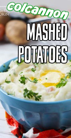 mashed potatoes in a blue bowl with parsley on top and the words colcanon mashed potatoes above it