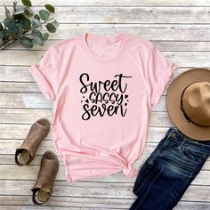 Sweet Seven Girl Shirt, 7th Birthday Girl T-Shirt, Seven Birthday Tshirt, Sweet 7th Tees, Girl Birthday Gifts, Birthday Cute Girls Outfit Hello! First of all thank you for being here and checking out our finest t-shirt designs. As Mudo Boutique, we dedicated ourselves to provide the best possible service for our valuable customers. In order to provide you best service, we are using the quality materials and beautiful designs. You can always contact us for your questions or for your suggestions. We are open for your suggestions. - Please check the size chart before you order your T-shirt. - Make sure that you have the right item on your cart. - If you want to have your order urgently, please contact us and we will do our best to ship your order faster. - In order to use your T-shirts in lon Trendy Pink T-shirt For Birthday, Sweet Graphic Print Birthday T-shirt, Sweet Graphic Print T-shirt For Birthday, Sweet Letter Print T-shirt For Birthday, Sweet Pink T-shirt For Birthday, Cute Slogan T-shirt For Birthday, Girl Birthday Gifts, Birthday Girl T Shirt, Birthday Cute