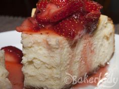 a piece of cheesecake with strawberries on top