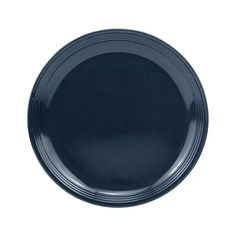 an empty black plate on a white background