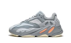 The adidas Yeezy Boost 700 “Inertia” is the fourth colorway released of the popular chunky sneaker by Kanye West and adidas.  The decidedly soft color palette features multiple shades of grey across the premium leather, suede, and mesh upper with light pink accents on the oval-shaped details of the midsole and reflective silver accents throughout.  A cream white rubber outsole finishes off the clean look for the Yeezy “dad shoe” silhouette.  Another essential drop in the adidas Yeezy sneaker lin Dad Shoe, Adidas Yeezy 700, 350 Boost, Yeezy Sneakers, Yeezy 700, Baskets Adidas, Stadium Goods, Nike Air Max 97, Chunky Sneakers