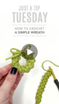 someone is crocheting a loop with the help of a video to make it look like they are knitting