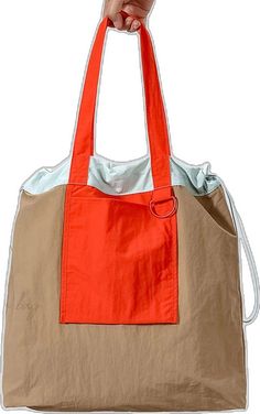 Casual Orange Cotton Shoulder Bag, Summer Shopping Canvas Bag With Pockets, Summer Canvas Bag With Pockets For Shopping, Summer Canvas Shopping Bag With Pockets, Casual Color Block Shoulder Bag For Travel, Casual Color Block Shoulder Bag For Daily Use, Orange Canvas Bag With Large Capacity For Daily Use, Trendy Summer Canvas Bag With Pockets, Orange Large Capacity Canvas Bag For Daily Use