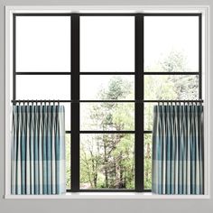 an open window with blue curtains and trees in the background