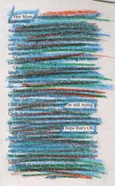 an open book with colored crayons on the pages and words written in it