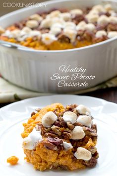 sweet potato casserole topped with marshmallows and chocolate chips on a white plate