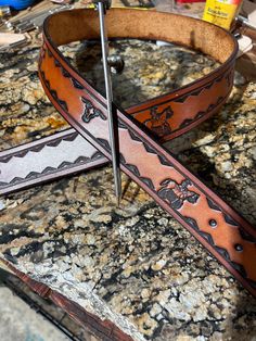 Made to order, one of a kind custom belts. High quality belts made to last and look good for years. Handmade Artisan Leather Belt Buckles, Artisan Handmade Leather Belt Buckles, Custom Engraved Brown Belts, Custom Brown Engraved Belts, Custom Handmade Leather Belts, Handmade Custom Leather Belts, Custom Belts, Custom Belt, Belts