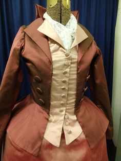 "We are unusually busy this year, so custom sizes require a THREE MONTH wait. Your costume will not be made until late October, and it will NOT ARRIVE IN TIME FOR HALLOWEEN 18th century ensemble inspired by \"Angelica\" designs in the musical \"Hamilton\". Available in many fabrics and colors. Contact us for details. We are happy to make any style/fit/fabric changes you like. The customer from these photos wanted to reuse the rose colored skirt from her other Angelica dress, so the fabric draped Elegant Fitted Victorian Dress For Fancy Dress, Regency Style Costume Dress With Buttons, Victorian Costume Dress With Buttons, Victorian Style Costume Dress With Buttons, Elegant Fitted Victorian Dress In Baroque Style, Fitted Victorian Dress With Buttons, Historical Victorian Dress With Buttons, Fitted Victorian Historical Dress, Medieval Style Fitted Formal Dress