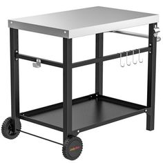 a black and white kitchen cart with two trays on it's wheels, holding utensils