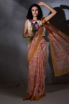 Peach saree featuring geometric and floral hand block print all over. - Aza Fashions Fitted Floral Print Chanderi Pre-draped Saree, Chanderi Pre-draped Saree With Printed Motifs For Navratri, Wedding Chanderi Pre-draped Saree With Block Print, Chanderi Pre-draped Saree With Printed Motifs, Silk Block Print Pre-draped Saree, Bohemian Pre-draped Fitted Saree With Printed Motifs, Silk Pre-draped Saree With Block Print, Designer Wear Block Print Pre-draped Saree, Orange Block Print Dupatta