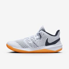 the nike kd trey basketball shoe in white and black with an orange soles