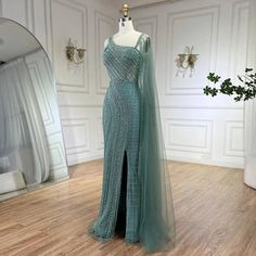 a dress on display in front of a mirror