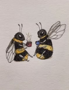 two bees sitting next to each other drinking coffee