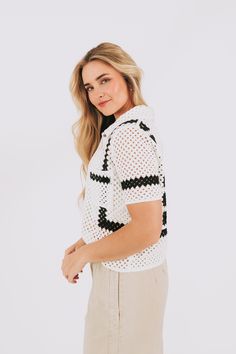 Take your style to the next level with the Higher Levels Top. This unique top features a stunning crochet design, 1 convenient pocket, and a bold color block point for added flair. Upgrade your wardrobe and stand out from the crowd with this must-have top. Details Crochet 1 pocket Color block point Sizing Approximate measurements: SIZE LENGTH BUST One Size 21" 42" Fabric has no stretchModel is 5’9 Material 100% CottonHand wash coldHang dry Chic White Knit Blouse, Short Sleeve Open Knit Crochet Top For Day Out, Trendy White Top With Crochet Trim, Trendy White Tops With Crochet Trim, Casual White Tops With Crochet Trim, Chic Tops With Crochet Trim For Day Out, White Crochet Trim Top For Day Out, White Textured Crochet Top For Vacation, White Casual Knit Top With Crochet Trim