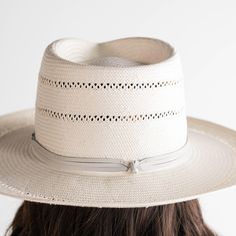 The straw fedora, elevated. The Arlo is a teardrop crown with a stiff, upturned brim featuring handmade venting on crown + brim with a leather multi-strand band attached. Style - Teardrop Rancher Material - Paper Straw Dimensions - Crown 10 cm Brim 9 cm Check out the rest of our full straw hat collection or find more wide brim straw hats! Need help with finding your hat size? See our hat sizing post here. White Fedora Hat, White Fedora, Gigi Pip, Lifeguard Hat, Hand Sewn Leather, Wide Brim Straw Hat, Straw Fedora Hat, Pressed Paper, Straw Fedora