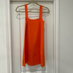 Never Worn, Perfect Condition Chic Orange Lined Midi Dress, Spring Orange A-line Mini Dress, Spring Orange Stretch Sleeveless Dress, Summer Orange A-line Midi Dress, Chic Orange Fitted Sleeveless Dress, Orange A-line Midi Summer Dress, Orange A-line Midi Dress For Summer, Chic Fitted Sleeveless Orange Dress, Orange Fitted Dress With Straight Neckline