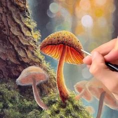 someone is painting a mushroom in the forest