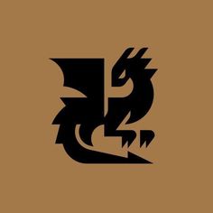 the letter s with a dragon on it's head is shown in black and brown