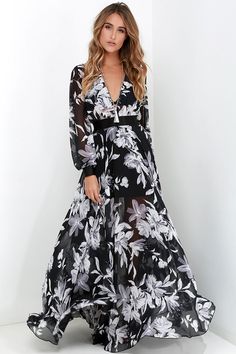 Get glamorous in the Buzios Beauty Black and Ivory Floral Print Maxi Dress with a sheer bodice, billowy long sleeves, and a maxi skirt that falls from an elastic waist. Long Dresses With Sleeves, White Long Dresses, Black And White Long Dresses, Long Sleeve Chiffon Maxi Dress, Floral Print Chiffon Maxi Dress, Vestidos Maxi, Cherry Print Dress, Short Beach Dresses, Classic Dresses