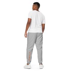 The unisex track pants are your new go-to piece for working out or styling a streetwear outfit. The water-resistant, lightweight fabric and mesh lining provide comfort, while elastic ankle cuffs will make it easy for you to show off your kicks. Style it with a windbreaker for a complete look and feel. • 100% polyester • Fabric weight: 2.21 oz/yd² (75 g/m²) • Lightweight, water-resistant fabric • Fully lined, mesh lining • Relaxed fit • Elastic waistband and ankle cuffs • Zip pockets • Sits at hi Long Distance Runner, Decrease Weight, Ankle Cuffs, Water Resistant Fabric, Streetwear Outfit, Daily Workout, Working Out, Lightweight Fabric, Track Pants