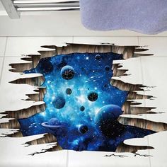 an image of a hole in the wall with space and stars on it, as if from outer space