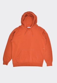 Sorry! This item is sold out. 
POP Trading Company Logo Hooded Sweater - Cinnamon Stick Founded in 2013 by Peter Kolks and Ric Van Rest, Pop Trading Company, is named in reference to 'popping' your skateboard. The Amsterdam based platform started initially as a boutique stocking the likes of Norse Projects and Palace before Kolk's dad suggested they start their own clothing brand. With their 'why not' attitude the skaters started their first Pop Trading Company line which was backed by the likes of their close friend and GAG favourite Parra. Maintaining true to themselves Kolks and Van Rest have developed the aesthetic of the brand alongside their maturing selves to menswear meets skate. Sizing: Regular - Shop to size Materials: 100% Cotton 340gr p / m 2 - 3 panel hood construction - Rib c Spring Hoodie, Orange Hoodie, Street Sweatshirt, Basic Hoodie, Aesthetic Hoodie, Matching Sweatshirts, Norse Projects, Loose Outfit, Trading Company