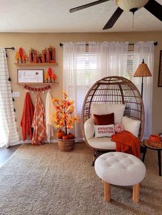 a living room filled with lots of furniture and decor on top of carpeted flooring