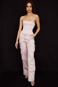 Our 'Daria' trousers combine elements of both tailored trousers and cargo styles, giving them an ultra chic vibe. Cut from our ultra luxe and lustrous duchess satin in a delicate crystal hue, they sit comfortably low on the natural waist and the relaxed straight legs are detailed with multiple flap pockets, inspired by military styles. The concealed button fastening creates a smooth, flat base that's perfect for tucking in or layering and are fully lined for comfort. Wear yours with our 'Liberty Corset And Trousers, Grey Corset, Crop Top Skirt Set, Fashion Background, Duchess Satin, Strapless Corset, Insta Models, Comfort Wear, Tall Girl