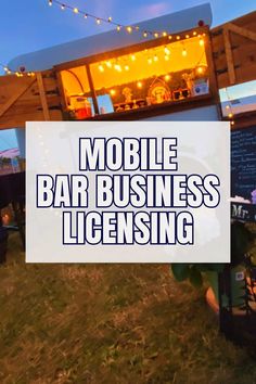 the mobile bar business license sign in front of a building with string lights on it