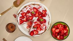 there is a pie with strawberries on it