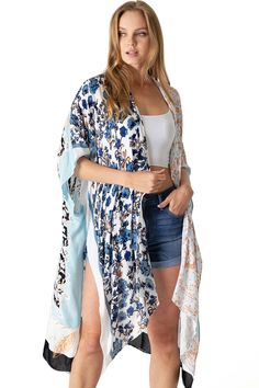 Boho print kimono with contrasting prints. Ultra light, draping open-front. Light and billowy silhouette, perfect for effortless layering. CARE | Hand Wash Cold or Dry Clean CONTENTS | 100% Viscose MEASUREMENTS | 36"/91 cm Top to Bottom (Size O/S) MODEL | 5'8 - wearing O/S IMPORTED Flowy Kimono For Daywear, Casual Open Front Kimono For Daywear, Spring Daywear Wrap Kimono, Spring Kimono With Abstract Print, Spring Wrap Kimono For Daywear, Summer Kimono With Abstract Print, White Open Front Kimono For Spring, Blue Rayon Kimono For Spring, Blue Bohemian Rayon Kimono