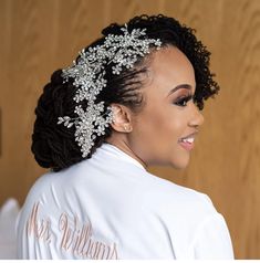 a woman wearing a bridal hair piece