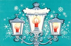 two red candles are lit on a green christmas card with snowflakes in the background