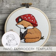 a fox with a red hat is sitting in front of an embroidery pattern that says hand embroidery template